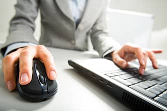 person using mouse and keyboard